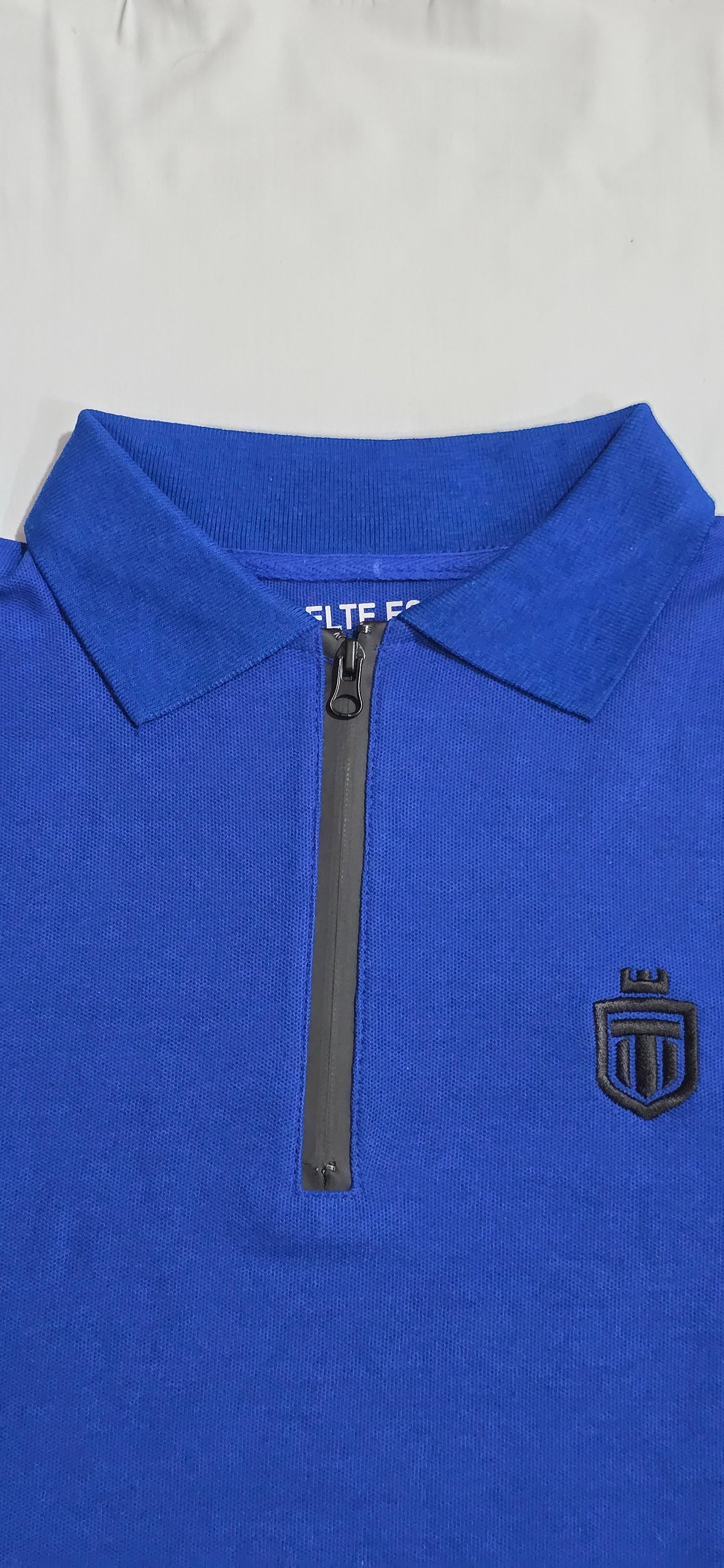Royal Blue drop-Shoulder, zip-up polo